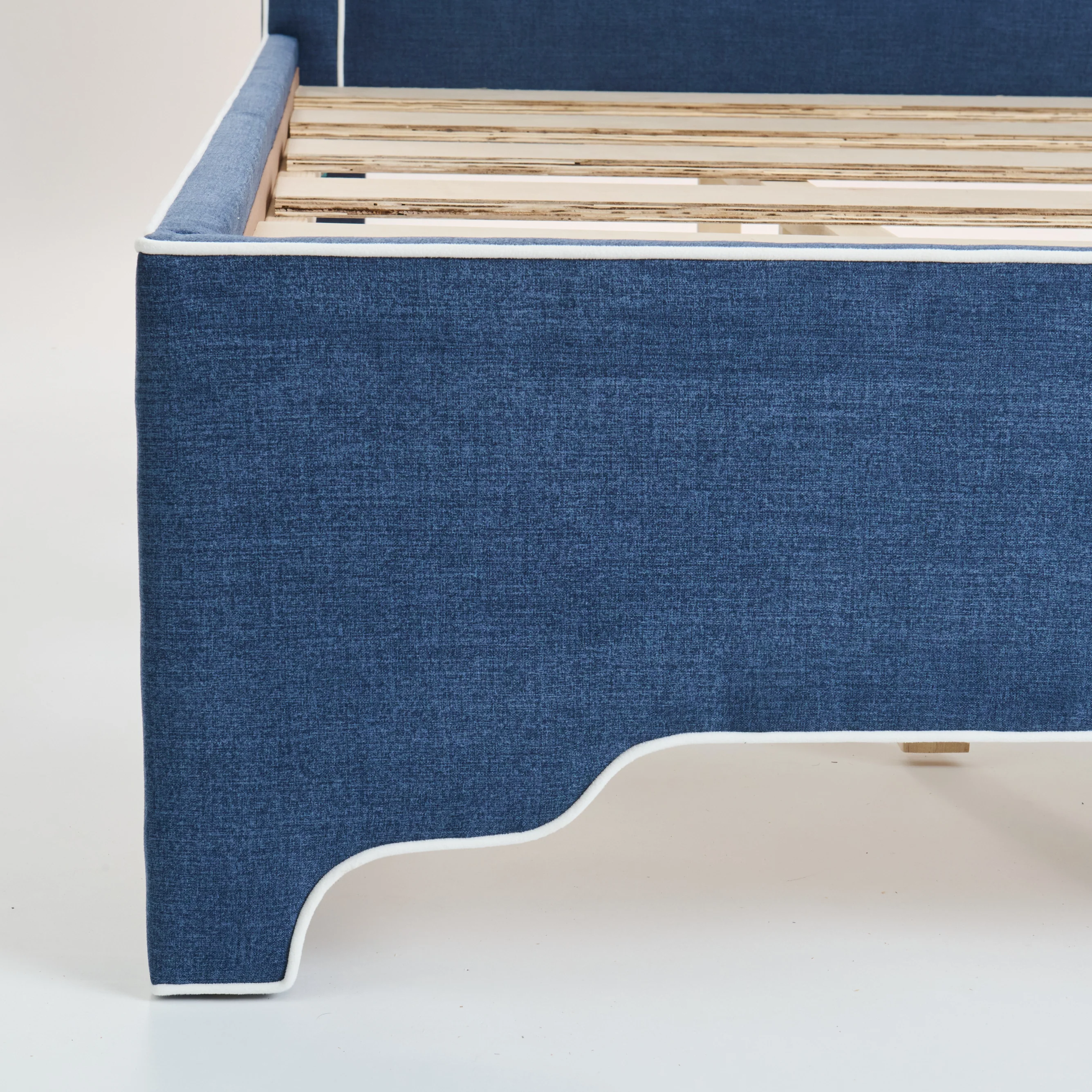 65"H Queen Upholstered Platform Bed - Scalloped Legs - Navy Woven Fabric with White Trim - Image 7